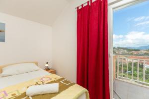 Postel nebo postele na pokoji v ubytování Apartments Vesna