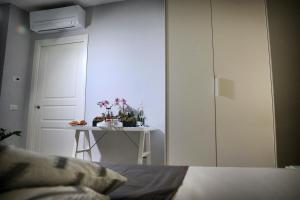 Postel nebo postele na pokoji v ubytování B&B Pompei Olympus