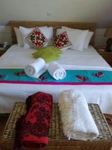 מיטה או מיטות בחדר ב-Ocean Bird & Wanita's Self Catering