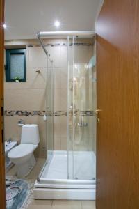 Ванна кімната в Apartments Holiday Lux