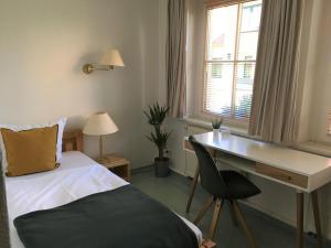 מיטה או מיטות בחדר ב-Hotel-Pension Seeadler