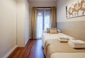 Posteľ alebo postele v izbe v ubytovaní Casa de Bisagra