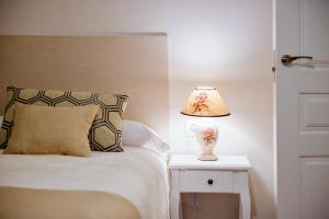 Posteľ alebo postele v izbe v ubytovaní Casa de Bisagra