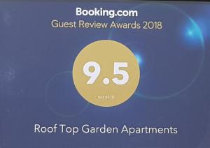 ベルファストにあるRooftop Apartmentsの屋上ガーデンアパートメントの看板のスクリーンショット