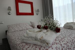 Voodi või voodid majutusasutuse Max Luxury Suite - Servizio Spiaggia Inclusa toas