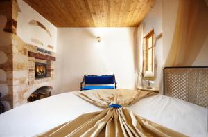 Postel nebo postele na pokoji v ubytování Casa Perla Suites