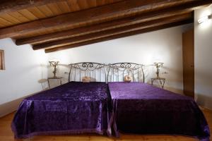 Postel nebo postele na pokoji v ubytování Casa Perla Suites