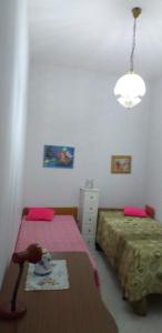 Uma cama ou camas num quarto em New Apartment pink