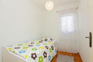 Posteľ alebo postele v izbe v ubytovaní Apartments Triporte