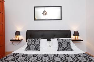 Posteľ alebo postele v izbe v ubytovaní Apartments Triporte