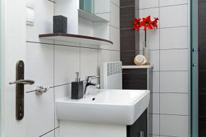 Kúpeľňa v ubytovaní Apartments Triporte