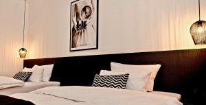 Кровать или кровати в номере Hotel Merian