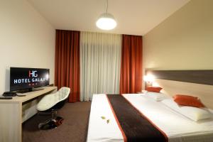 TV a/nebo společenská místnost v ubytování Hotel Galaxy