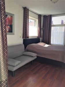 Postel nebo postele na pokoji v ubytování Westerschelde B&B