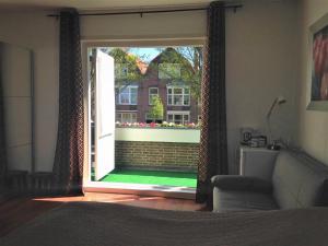 Postel nebo postele na pokoji v ubytování Westerschelde B&B