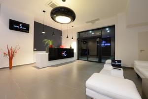 TV a/nebo společenská místnost v ubytování Hotel Galaxy