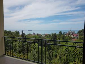 a balcony with a view of the ocean at Iberia 2019 in Batumi