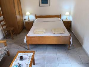 Postel nebo postele na pokoji v ubytování Spanos House