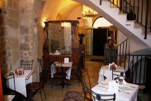 Ресторант или друго място за хранене в S.Andrea degli Armeni Dimora di Charme