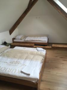 Posteľ alebo postele v izbe v ubytovaní Apartmán U Kapličky