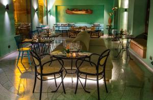 Een restaurant of ander eetgelegenheid bij Hotel Boutique Casona del Colegio