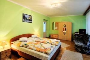 Ένα ή περισσότερα κρεβάτια σε δωμάτιο στο Privat Horec