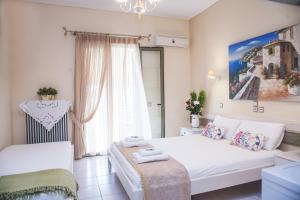 A bed or beds in a room at Nontas Home