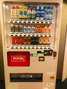 a vending machine filled with drinks and soda at The Celecton Fukushima in Fukushima