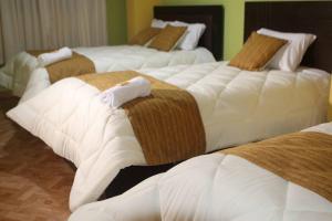 Katil atau katil-katil dalam bilik di Residencial el Valle