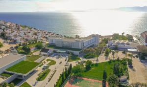 an aerial view of a building next to the ocean at ON'LIVE HOTEL in Çeşme