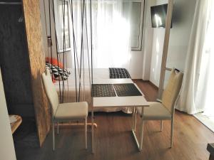 A television and/or entertainment centre at Lilliput Studio Corfu Old Town