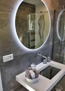 Koupelna v ubytování L'oliveraie du Fango + 49 fotografií