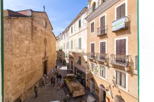 an overhead view of an alley in an old town at Centro Storico Carlo Alberto in Alghero