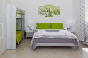 Postel nebo postele na pokoji v ubytování Paloma B&B