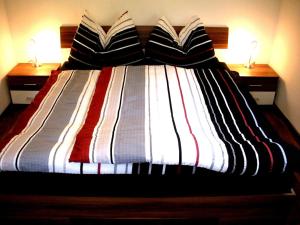 En eller flere senge i et værelse på Easyapartments Countryside