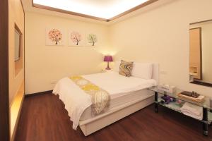 Katil atau katil-katil dalam bilik di Happiness Yes Hostel 3