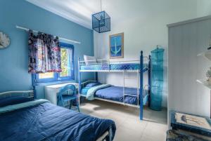Posteľ alebo postele v izbe v ubytovaní Navy Greece Villa with swimming pool & sea view + 32 fotografií