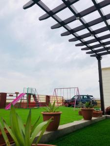 Vrt pred nastanitvijo Samt Guest House