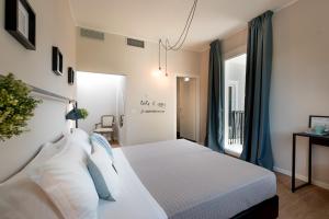 Un pat sau paturi într-o cameră la Hotel Vagabond