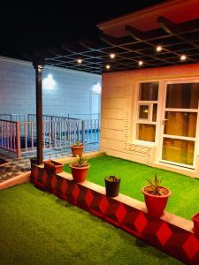 Vrt pred nastanitvijo Samt Guest House