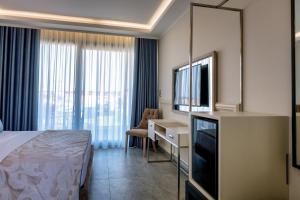TV a/nebo společenská místnost v ubytování Sunway Hotel