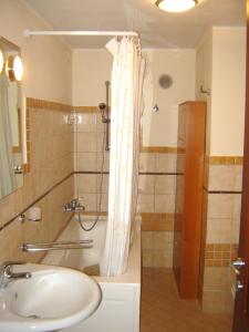 a bathroom with a shower and a sink at Casa Liliana in Oristano