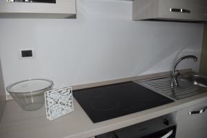 Η κουζίνα ή μικρή κουζίνα στο Eclisse House - close to the beach