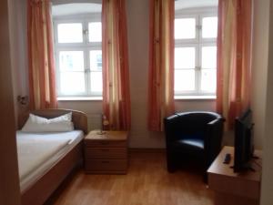 Postel nebo postele na pokoji v ubytování Altstadtpension