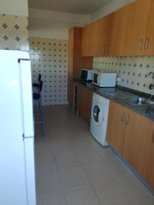 Een keuken of kitchenette bij Casa Alvor