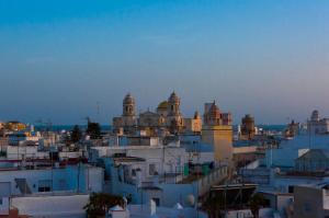 a view of a city with buildings and mosques at Hotel de Francia y París in Cádiz