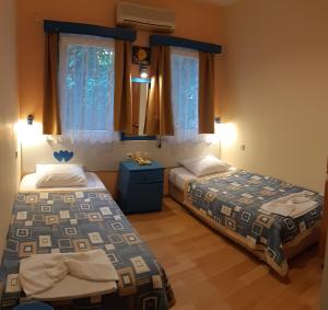 Cama o camas de una habitación en Kavala Studio Hotel