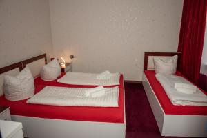 Voodi või voodid majutusasutuse Guest House VIP toas