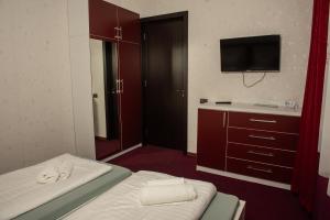 Voodi või voodid majutusasutuse Guest House VIP toas