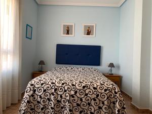 Postel nebo postele na pokoji v ubytování La Paz